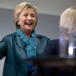Democratic presidential candidate Hillary Clinton is greeted by Sen. Patty Murray, D-Wash., as she arrives to speak during a campaign event at the IAM District 751 Everett Union Hall in Everett, Wash., Tuesday, March 22, 2016. (AP Photo/Carolyn Kaster)
