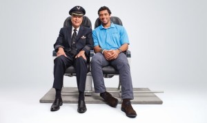 Mike Swanigan with Russell Wilson in an Alaska Airlines ad. (Alaska Airlines)