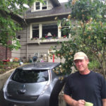 David Christensen in front of the old house in Wallingford where he helped Seattle Rainiers broadcaster Leo Lassen tend roses in the 1960s. (Feliks Banel)