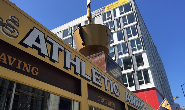 Monty Holmes says Athletic Awards trophy shop isn’t for sale, even though it's sitting on some va...