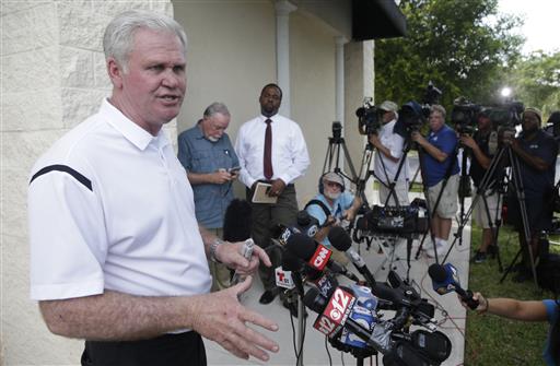 Robert Abell, co-owner of Lotus Gunworks, speaks to members of the media, Thursday, June 16 in fron...
