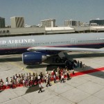 United Airlines employees gather around a Boeing 777 Thursday, May 18, 1995, at a hangar near Los Angeles International Airport for a preview of the airplane.  (AP Photo)