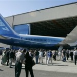 The first production model of the new Boeing 787 airplane is unveiled to an audience of several thousand employees, airline executives, and dignitaries during a ceremony Sunday, July 8, 2007, at Boeing's assembly plant in Everett. (AP Photo)