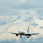 The new presidential campaign plane of democratic presidential candidate John Kerry comes into landing in front of Mt. Hood at the airport in Portland, Ore., Tuesday May 25, 2004. The trip from Washington to Portland was Kerry's first flight on the 757 200 Boeing jet. (AP Photo)