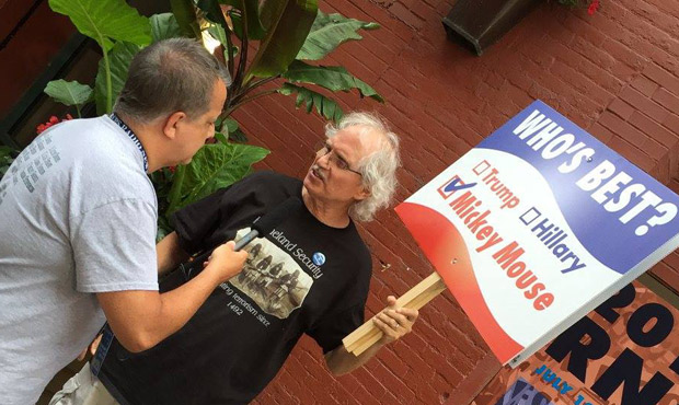 RNC protester Tom Mitchell and Dori Monson bond over their distrust of political parties. (Dori Mon...