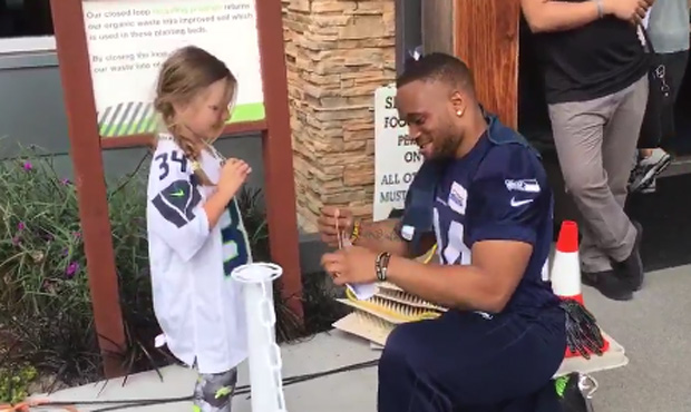 Thomas Rawls received a special gift from a fan Sunday. (Brady Henderson, 710 ESPN Seattle)...