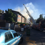 Fire crews at the scene of an apartment building. (Jan Kuwahara, KIRO 7)