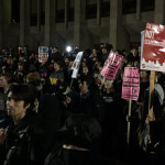 UW police say one person was found in Red Square with a gunshot wound during a protest. (Josh Kerns, KIRO Radio.)