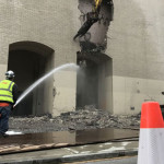 Within minutes, the original 1928 facade was revealed after more than 55 years. (Feliks Banel photo)