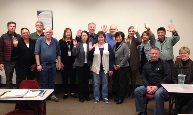 The members of the Renton WorkSource Job Club. Those with hands raised have run out of unemployment...
