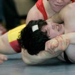 West Valley's Jeremy Fulk, top, pins Wasilla's Beebo Russell during session one in the 189-pound class of the state wrestling championships in Chugiak, Alaska, Friday, Feb. 2, 2007. (AP Photo/Al Grillo)