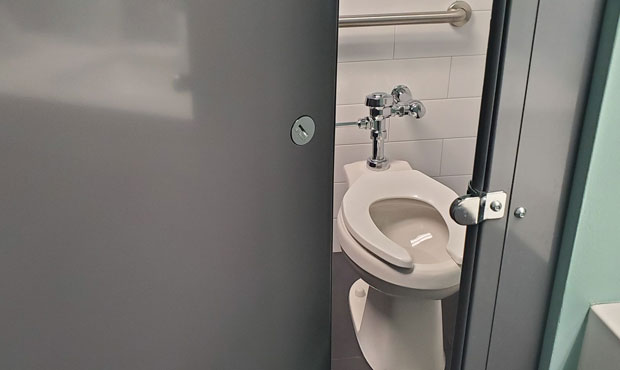 Phone, toilet stall, bathroom...
