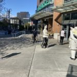 Whole Foods had a small line outside, only allowing 100 people into the store at a time. (Photo: Jason Rantz/KTTH)