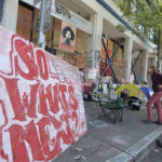 
              A sign in front of the Seattle Police Department's East Precinct building in the CHOP (Capitol Hill Occupied Protest) zone reads "So… What's Next?" Thursday, June 25, 2020, in Seattle. The area has been occupied by Black Lives Matter protesters since police pulled back from the building following violent clashes with demonstrators, and the future of the protest area has been in question since Seattle Mayor Jenny Durkan said earlier in the week that police intend to eventually return to the building. (AP Photo/Ted S. Warren)
            