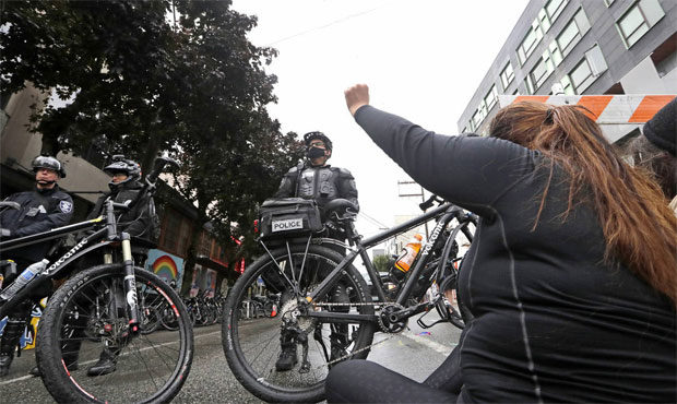 Seattle police, protesters...