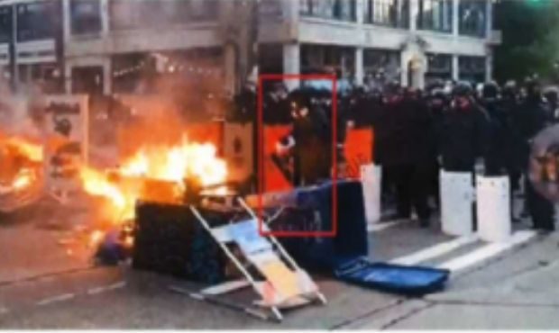 Jacob Greenberg, 19, is accused of assault and arson, captured in this photo squirting a flammable ...