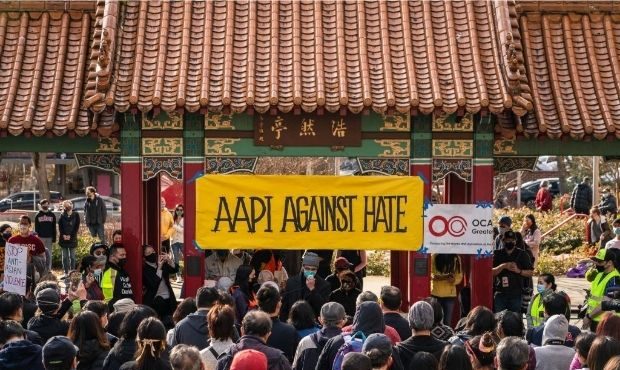 Demonstrators gather in the Chinatown-International District for a "We Are Not Silent" rally and ma...