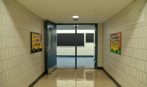 A hallway and billboard remain empty at Yung Wing School P.S. 124 on Sept. 24, 2020 in New York Cit...