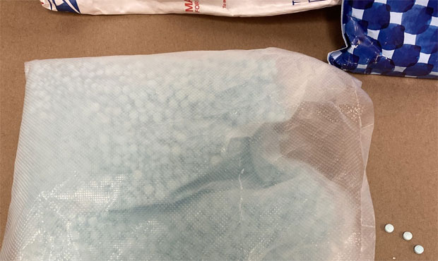 Man arrested after leaving bag with 15,000 fentanyl pills at Seattle hotel