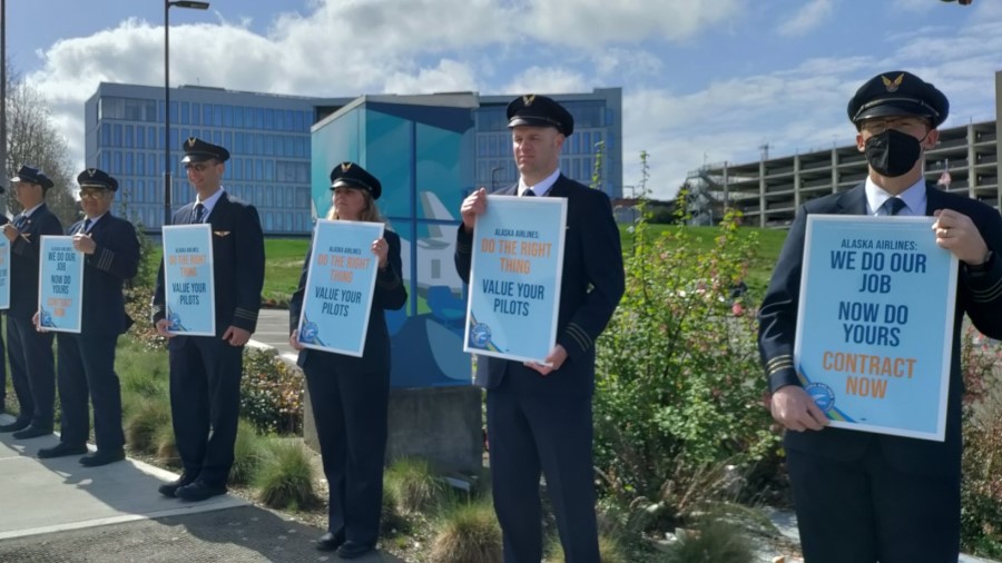 500 AlaskaAir pilots are picketing in front of the company's HQ near Sea-Tac Airport (Nicole Jennin...