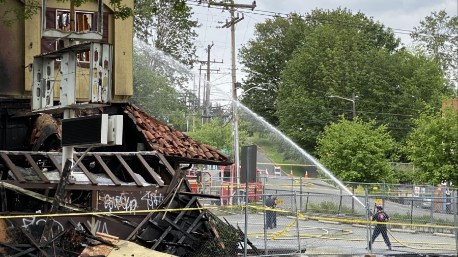 A day later, fire crews still work to put out hotspots of a Borracchini’s Bakery fire that began ...