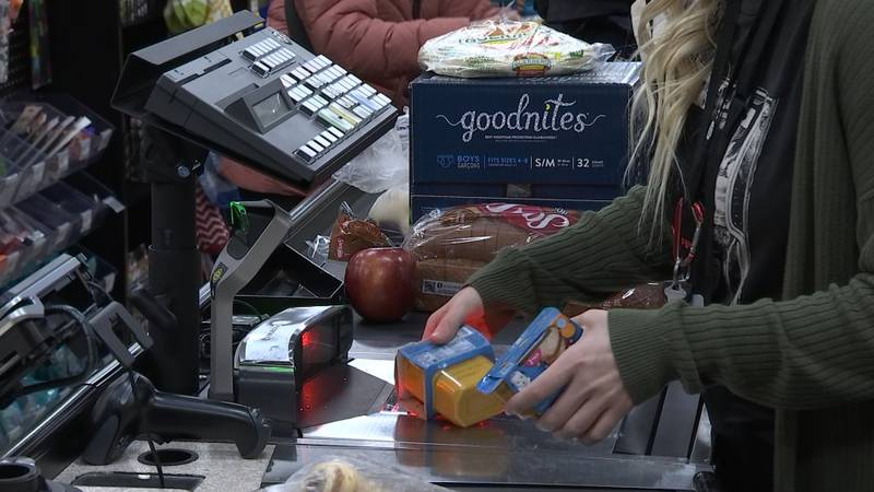 Lines grow outside local grocery stores, Photo from KIRO 7...