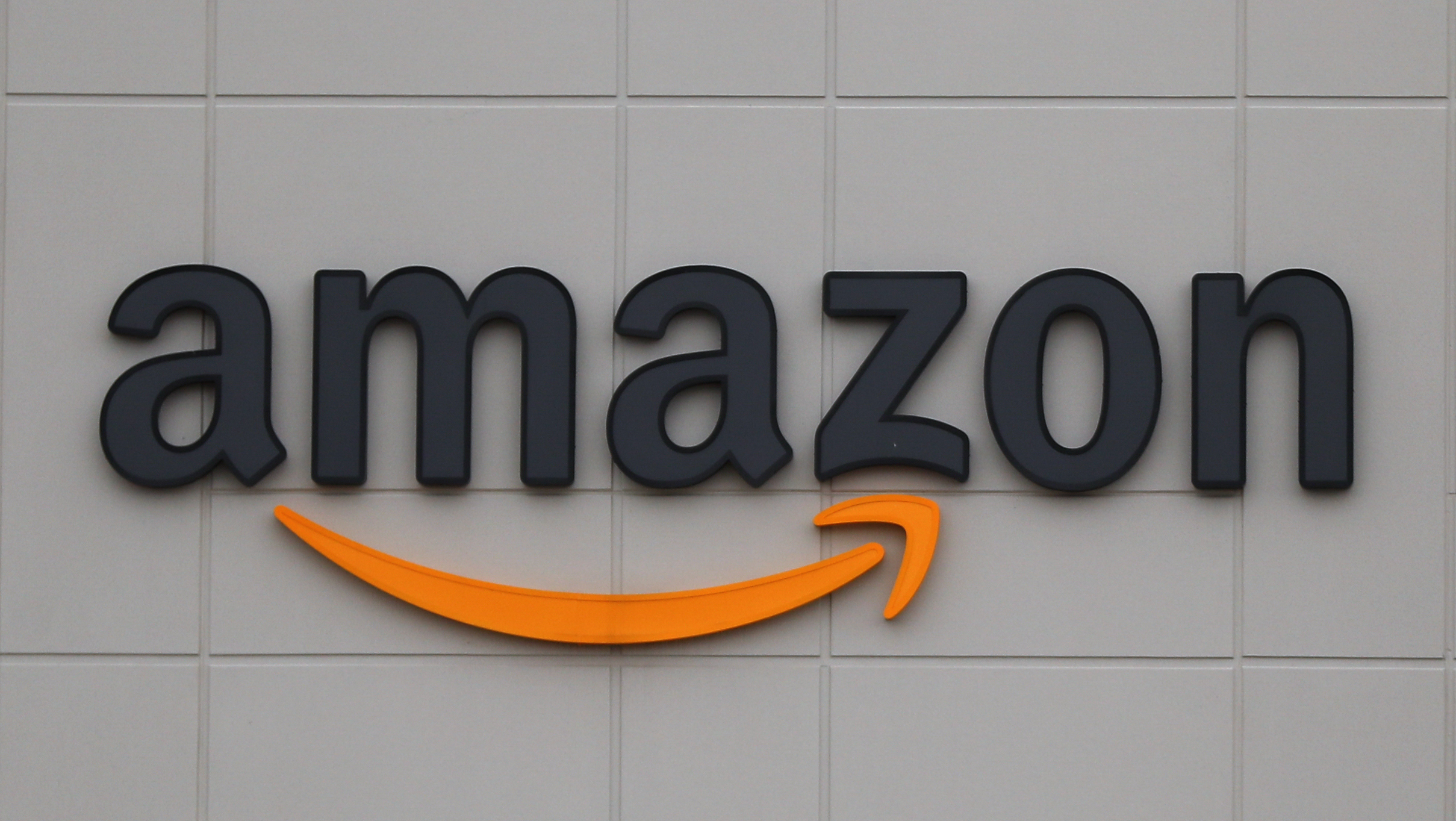 FILE - The Amazon DTW1 fulfillment center is shown in Romulus, Mich., April 1, 2020. Amazon has clo...