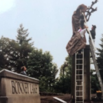 A photo of the installation of "The Ascent" by Larry Anderson in 1994