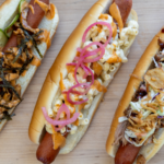 At each Seahawks home game, fans can take a bite out of the competition with specialty hot dogs from Versus Dogs. They're inspired by the opponent's hometown. 