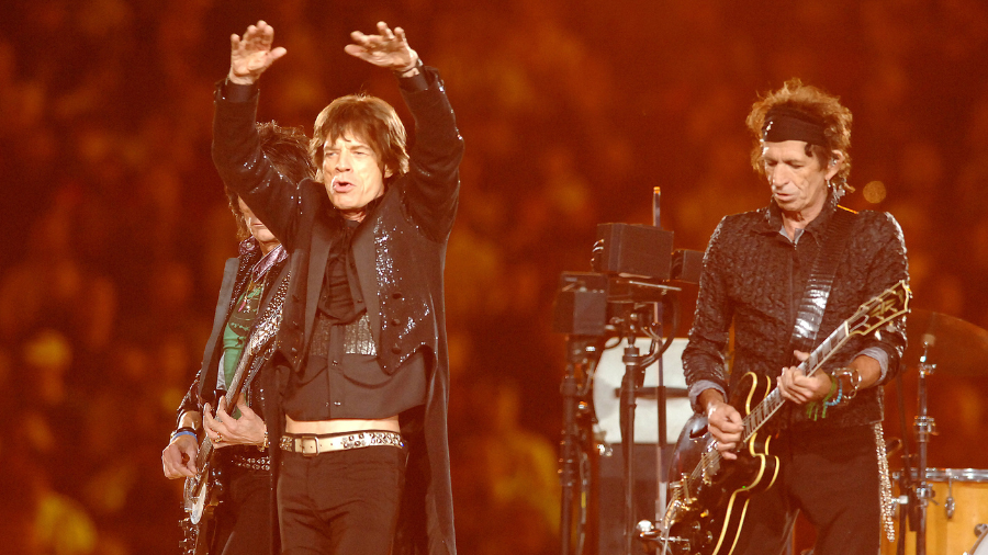 Ron Wood, Mick Jagger and Keith Richards of The Rolling Stones perform at halftime during Super Bow...