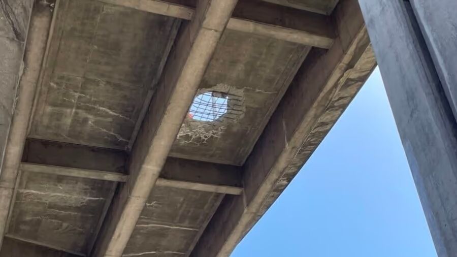 Photo: A hole in the West Seattle off-ramp to SR 99....