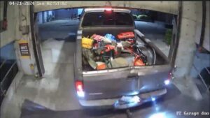 Photo: A man captured a photo of a truck, which was allegedly used to smash a garage gate, inside his condo's garage.