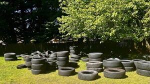 Photo: Vandals dumped 100 old tires in the backyard of a Shoreline church.
