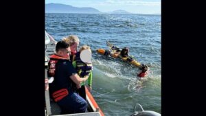 Photo: A group of people was rescued from their swamped kayaks.