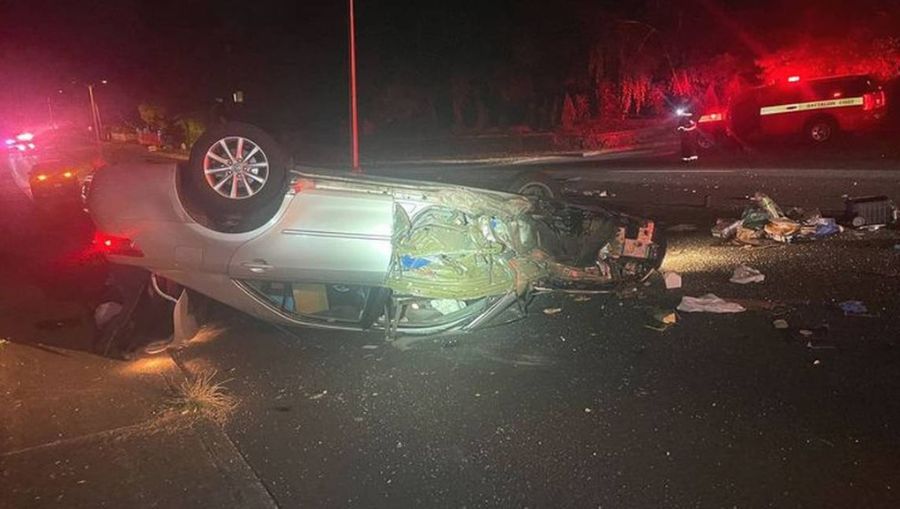 Photo: Police say a man reached for his chicken sandwich, flipping his car....