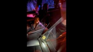 Photo: Handgun located inside a recovered stolen vehicle following the arrest.