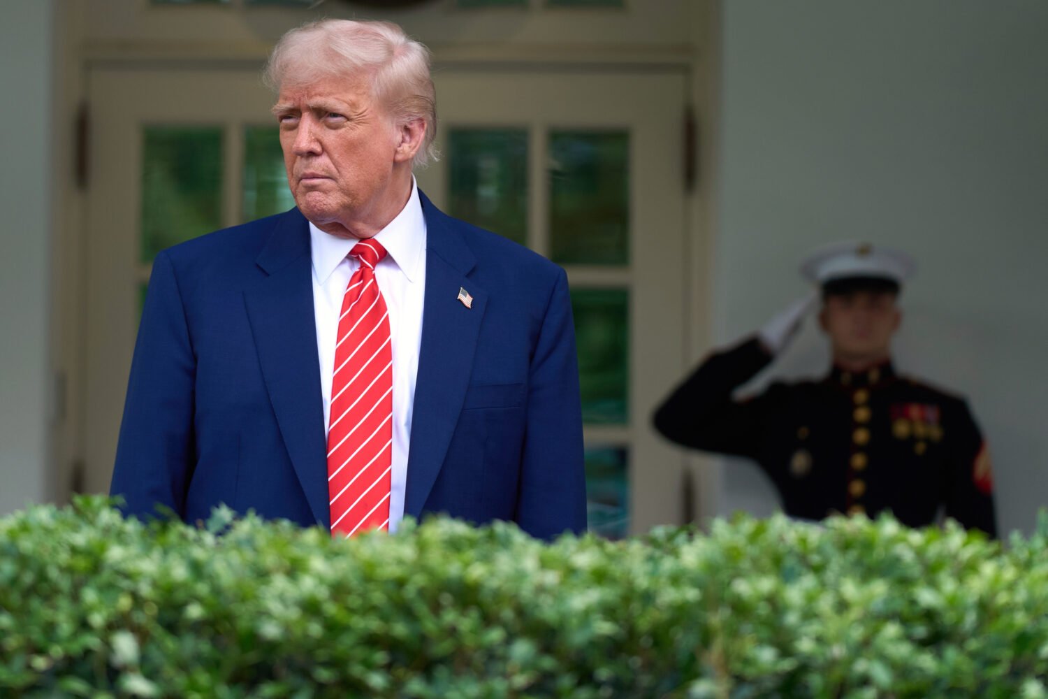 President Donald Trump speaks to reporters outside the West Wing of the White House, Thursday, May ...