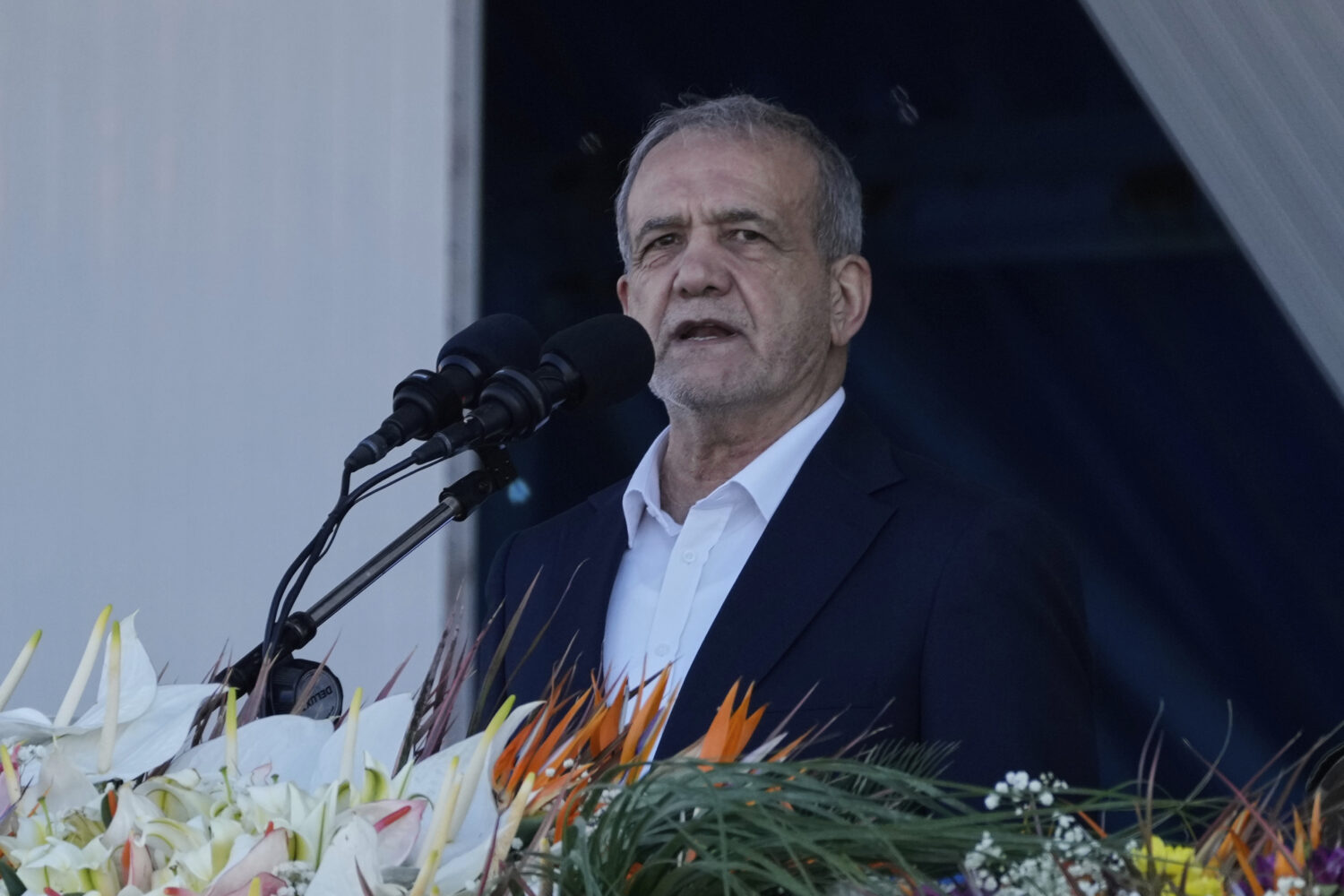 Iranian President Masoud Pezeshkian makes an address during the army parade commemorating National ...