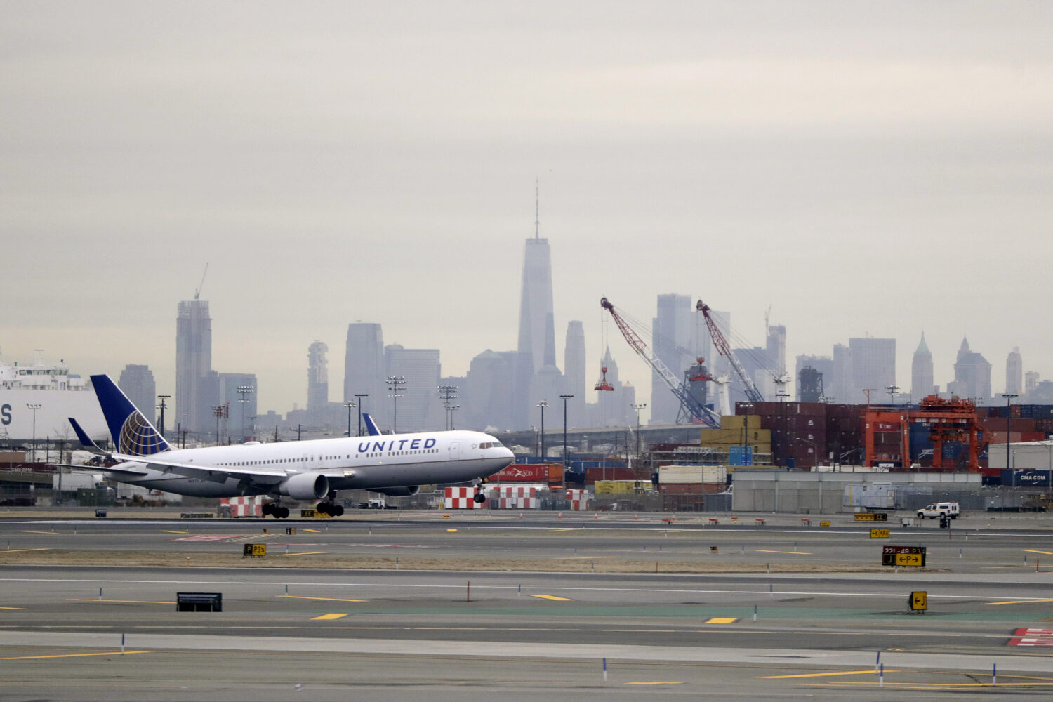 FILE - A United Airlines jet prepares touches down at Newark Liberty International Airport a day af...
