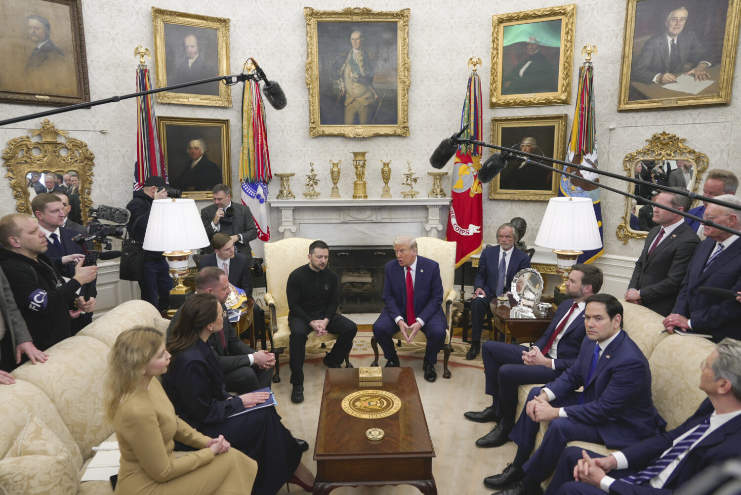 FILE - President Donald Trump, center right, meets with Ukrainian President Volodymyr Zelenskyy, ce...
