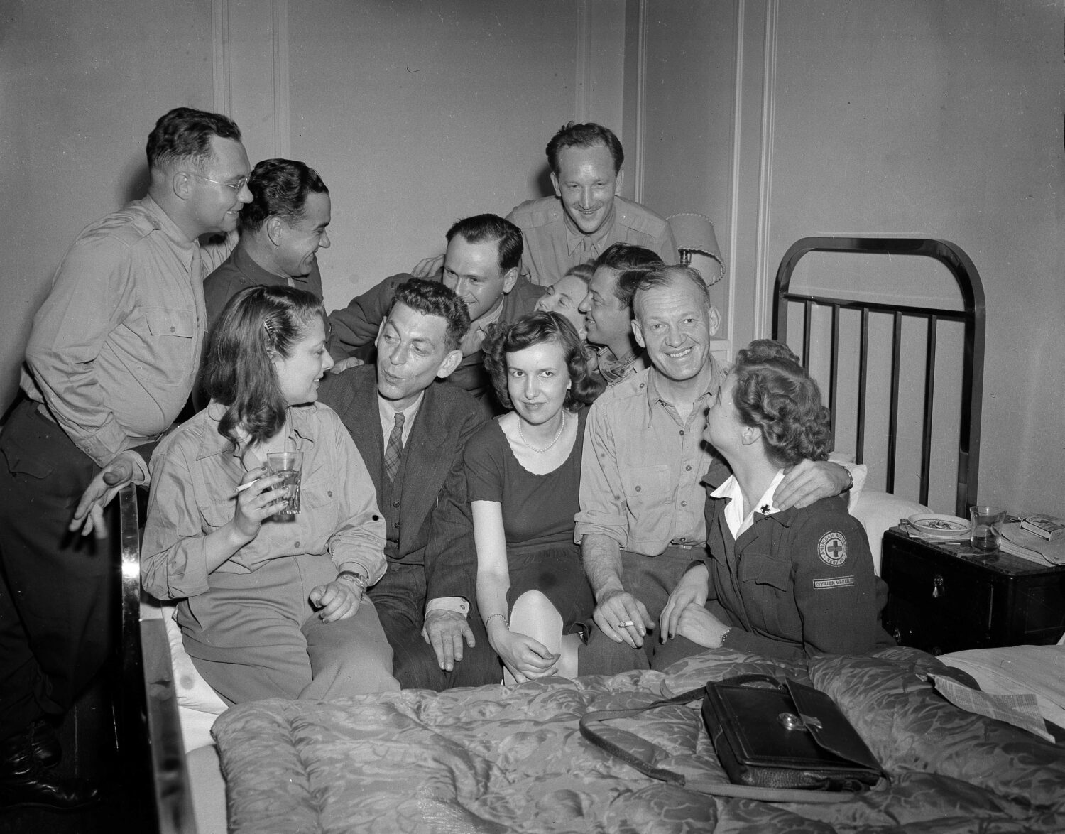 FILE - Some of the AP Paris staff join Paris Bureau Chief Ed Kennedy, seated center left, for a far...