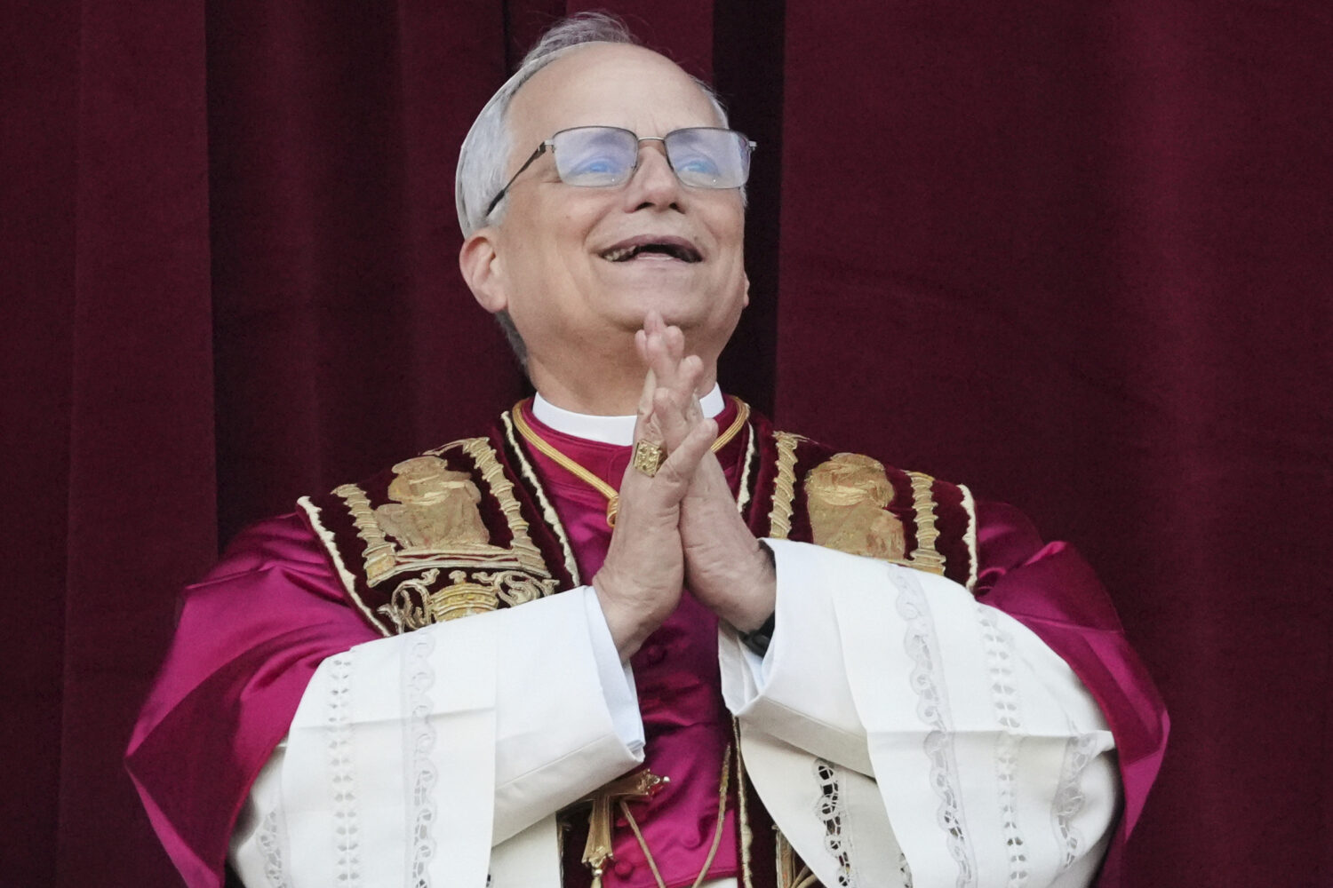 Newly elected Pope Leo XIV appears at the balcony of St. Peter's Basilica at the Vatican, Thursday,...