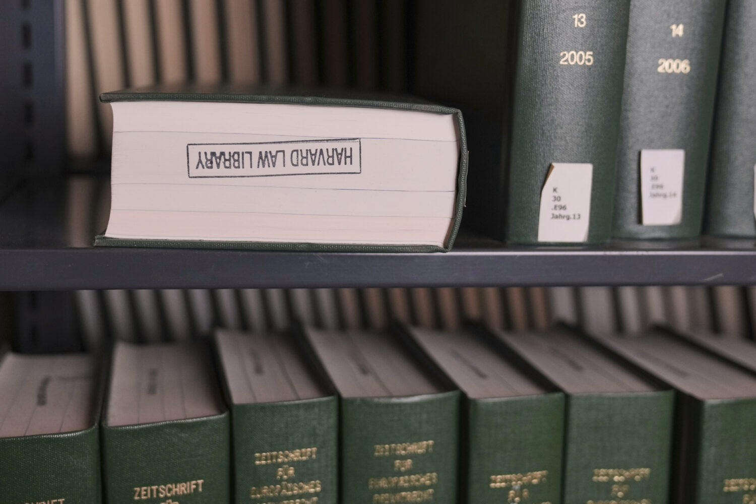 Books rest on a shelves at Langdell Hall, which houses the Harvard Law School library, Wednesday, F...