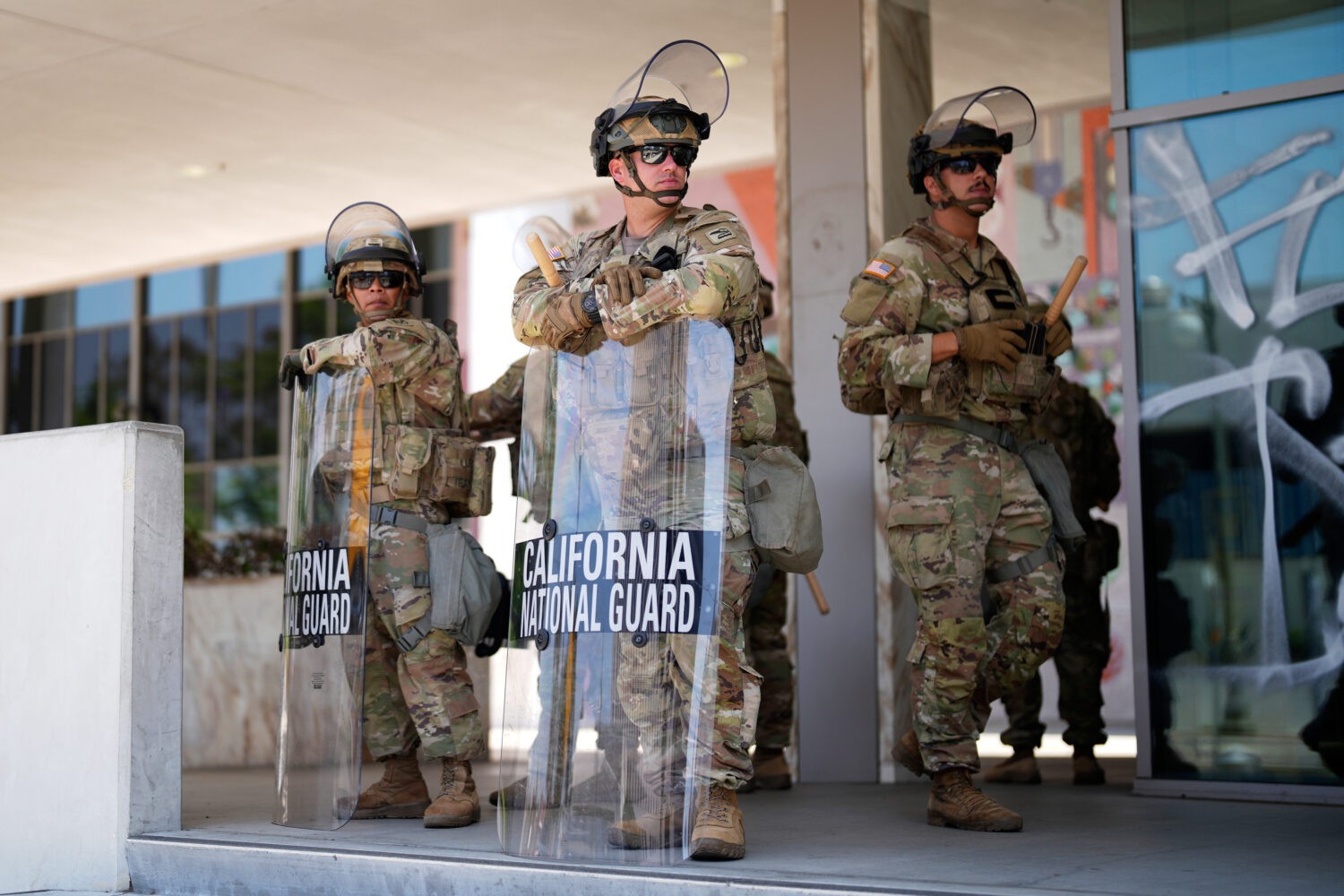 National Guard stand guard near the metropolitan detention center Monday, June 9, 2025, in downtown...