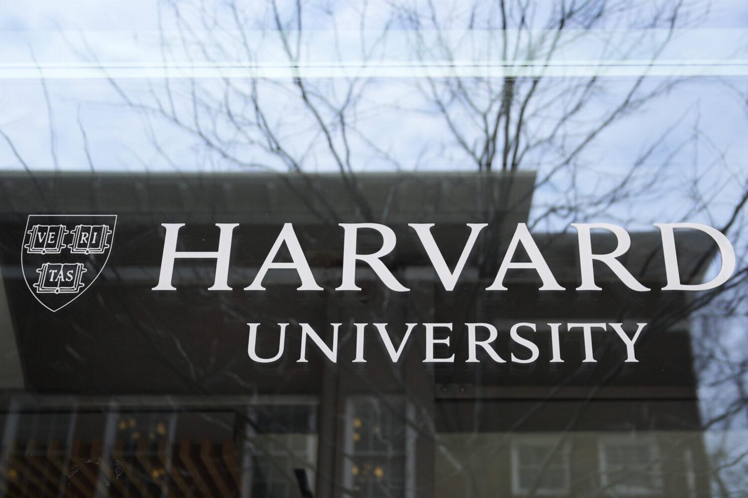 FILE - The Harvard University logo is displayed on a building at the school, Tuesday, April 15, 202...