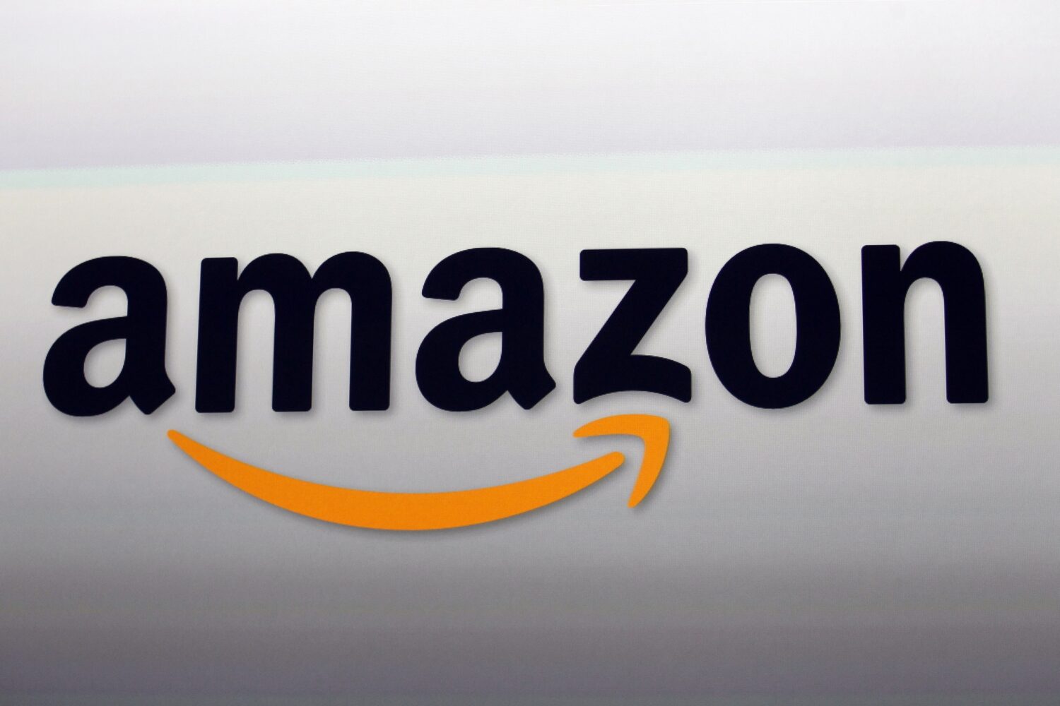 FILE - The Amazon logo is displayed, Sept. 6, 2012, in Santa Monica, Calif. (AP Photo/Reed Saxon, F...