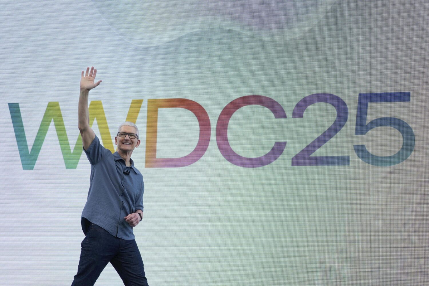 Apple CEO Tim Cook waves to attendees during an event on the Apple campus in Cupertino, Calif., Mon...