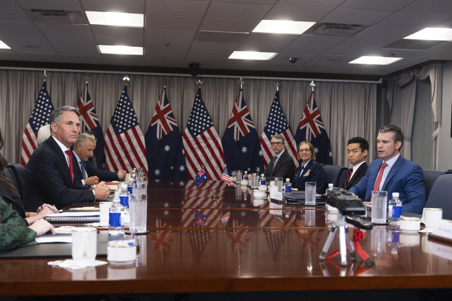 FILE - Secretary of Defense Pete Hegseth, right, welcomes Australian Deputy Prime Minister and Defe...