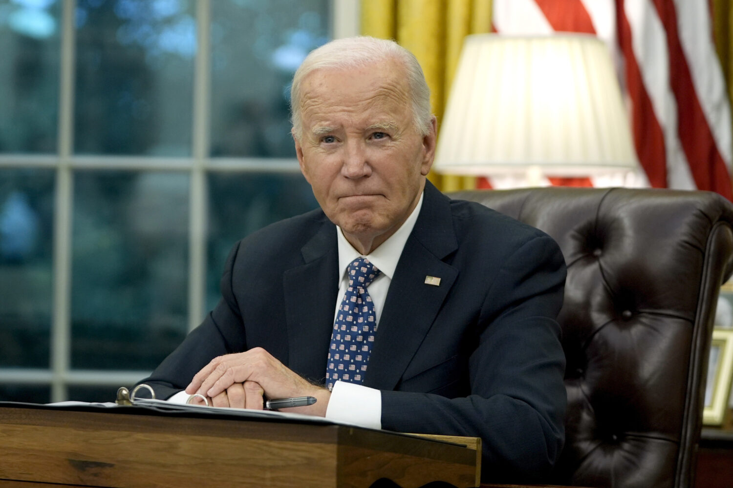 FILE - President Joe Biden speaks from the Oval Office of the White House in Washington, Sept. 30, ...