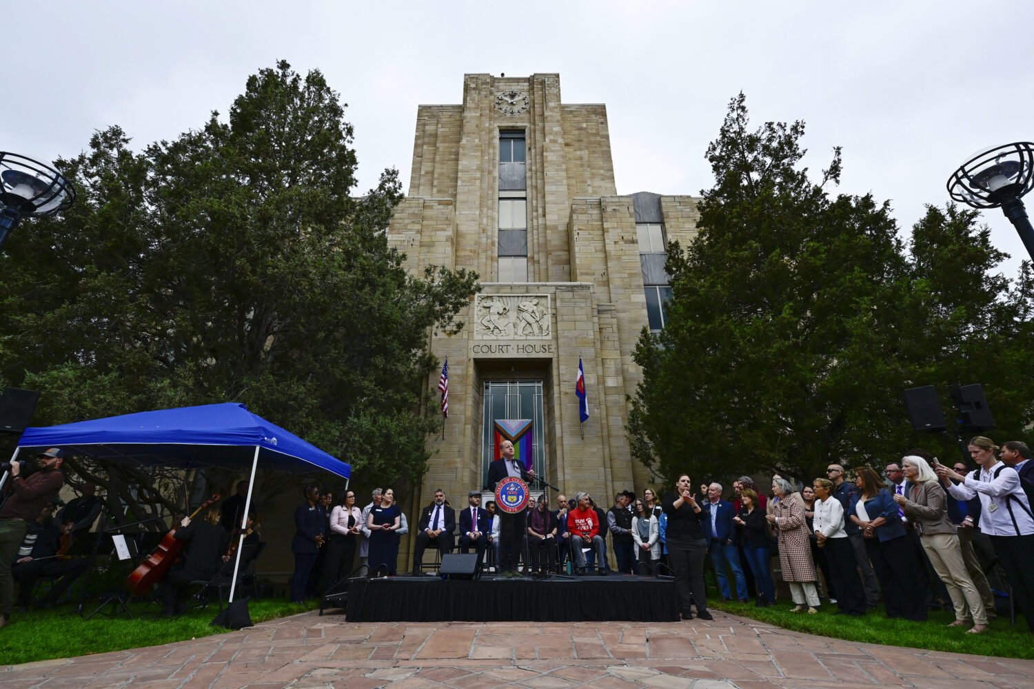 Colorado Governor Jared Polis speaks during an event outside the Boulder County Courthouse, Wednesd...